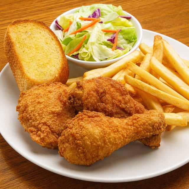 Fried Chicken Dinner With French Fries.